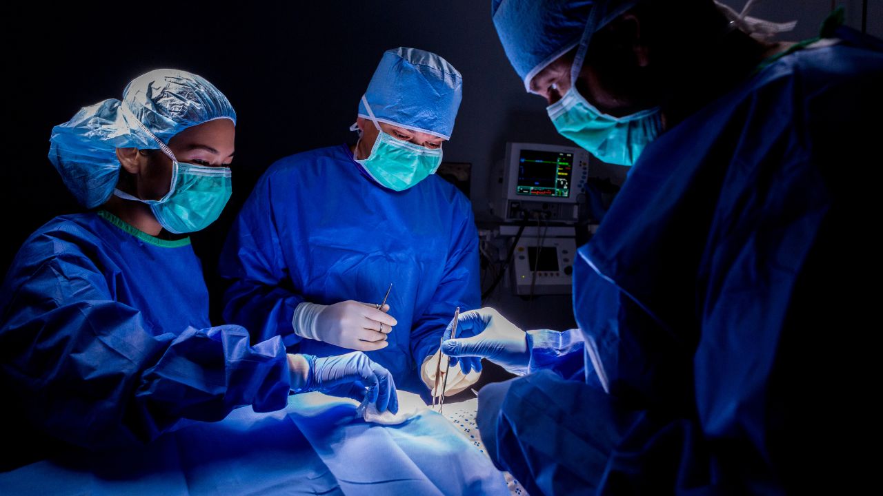 doctor and nurse in surgery room