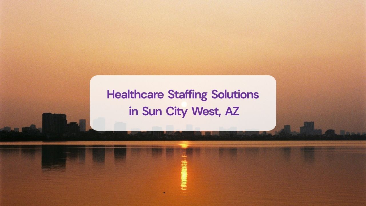 a view of the beach with some buildings around 