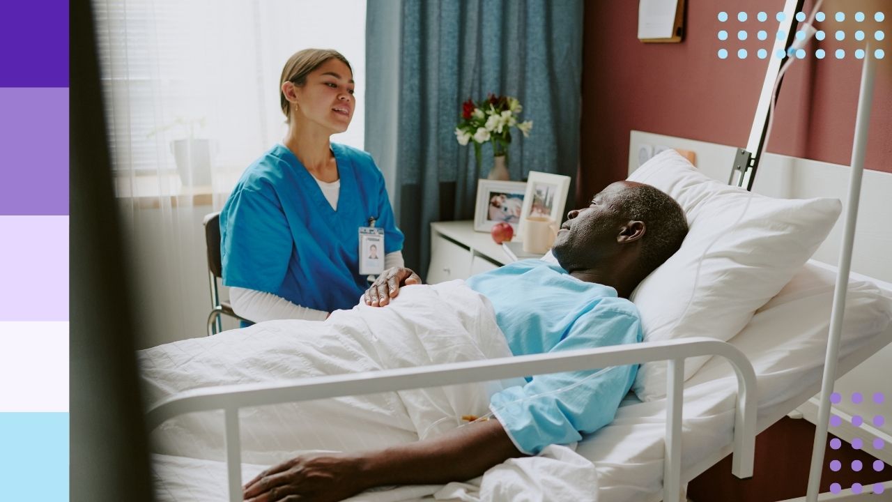 A nurse speaking with a patient in a hospital room setting