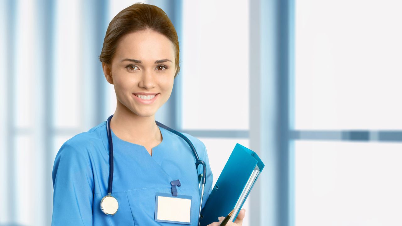 Nurse checking care plan