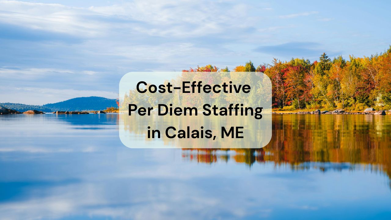 picture of a lake with a tree line in the background