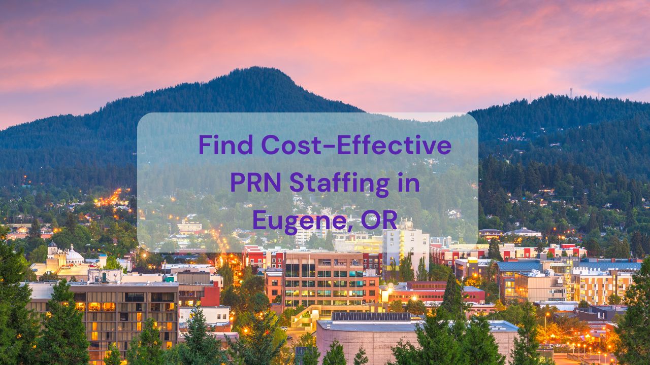 A picture of a city with mountains in the background