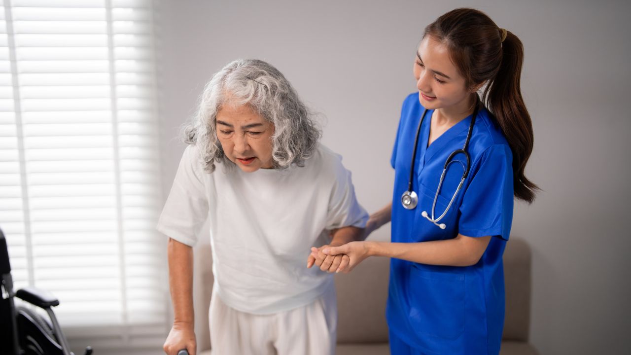A nurse take caring one old patient