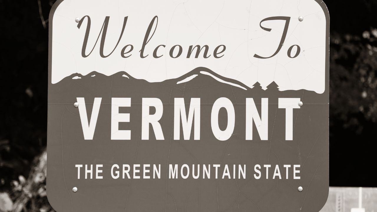 A picture of a welcome to Vermont sign