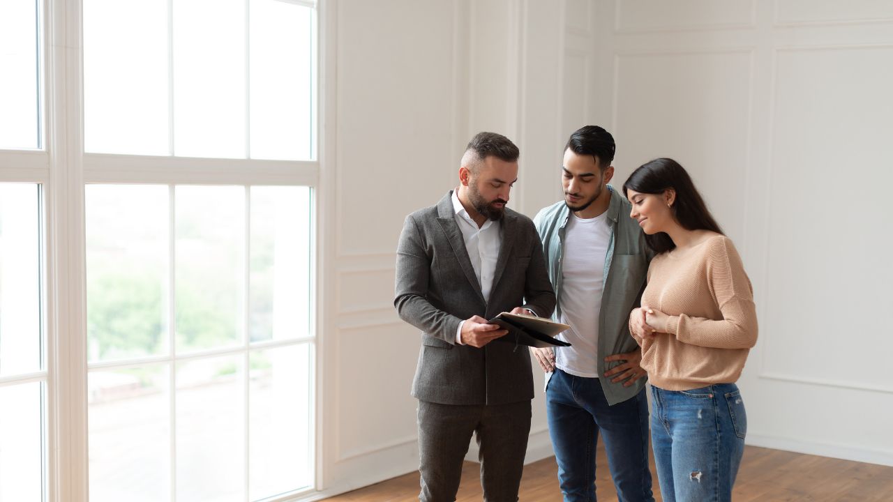 a couple buying a house