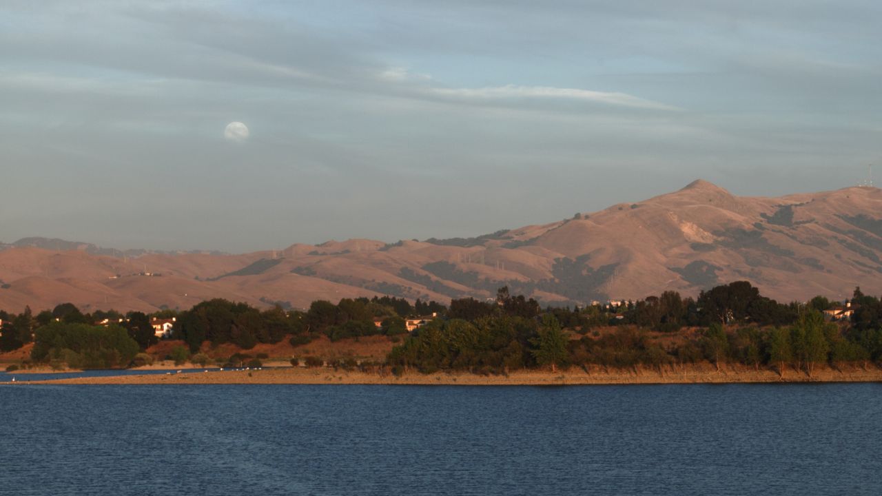 picture of mountain, sky and sea
