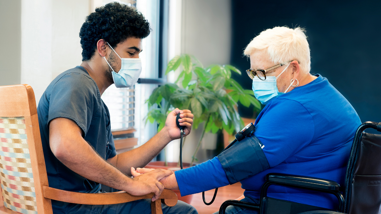 nursing assistant with resident