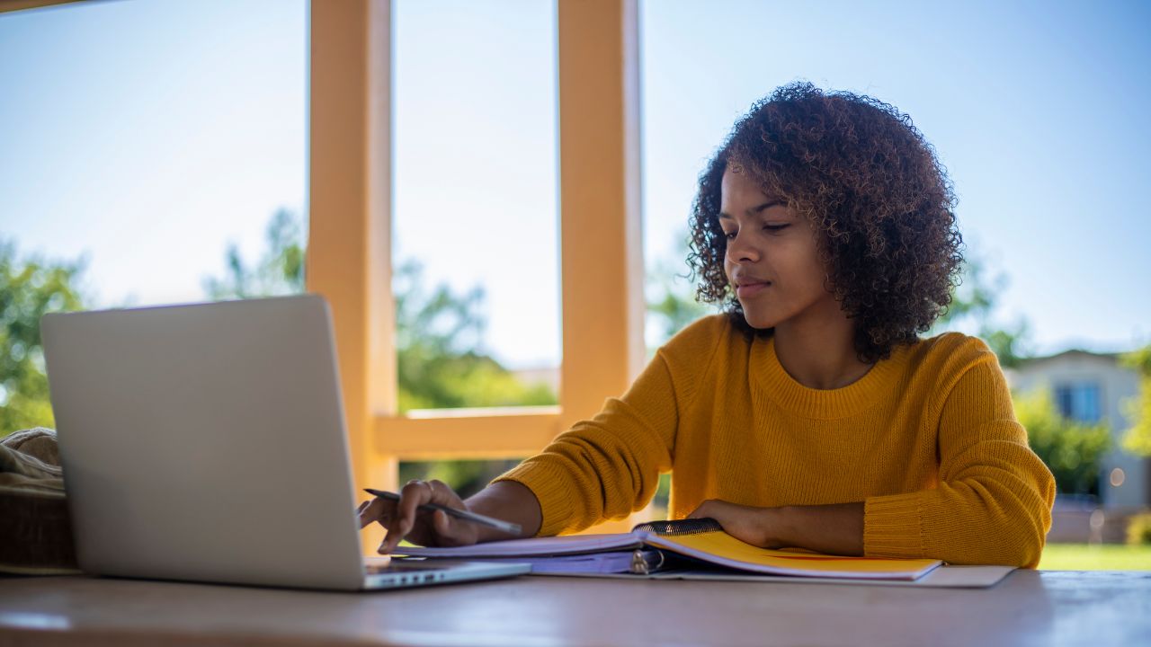 A student filling out a college application