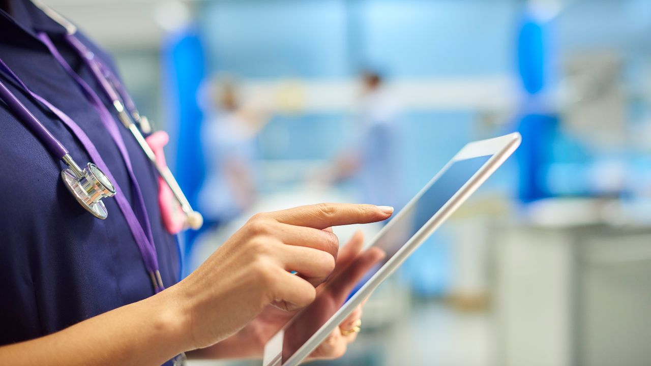 A nurse using a tablet