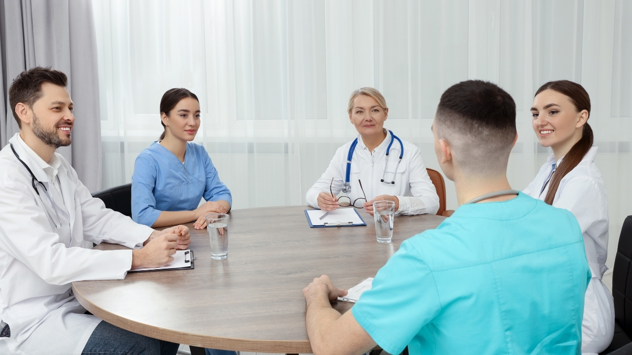People at a hospital have a meeting
