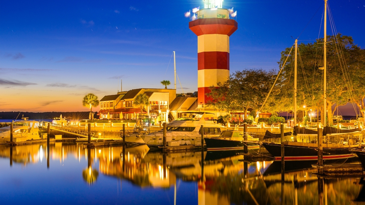 the pier with a lighthouse and the view of the sea