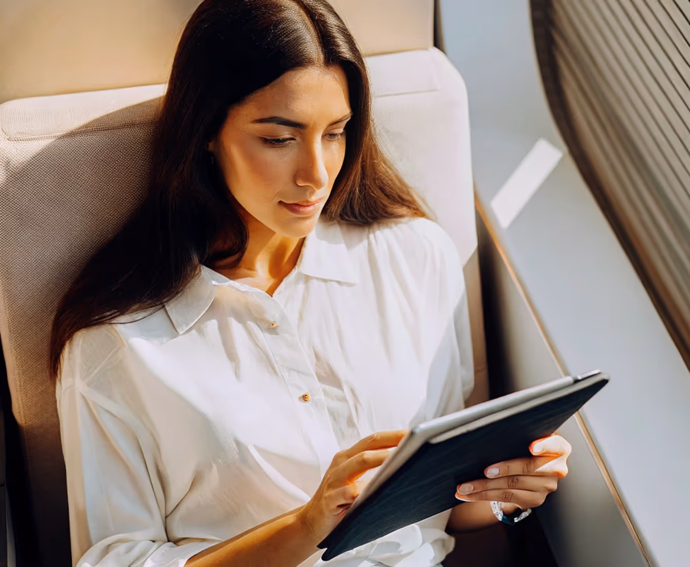 Woman reading on tablet