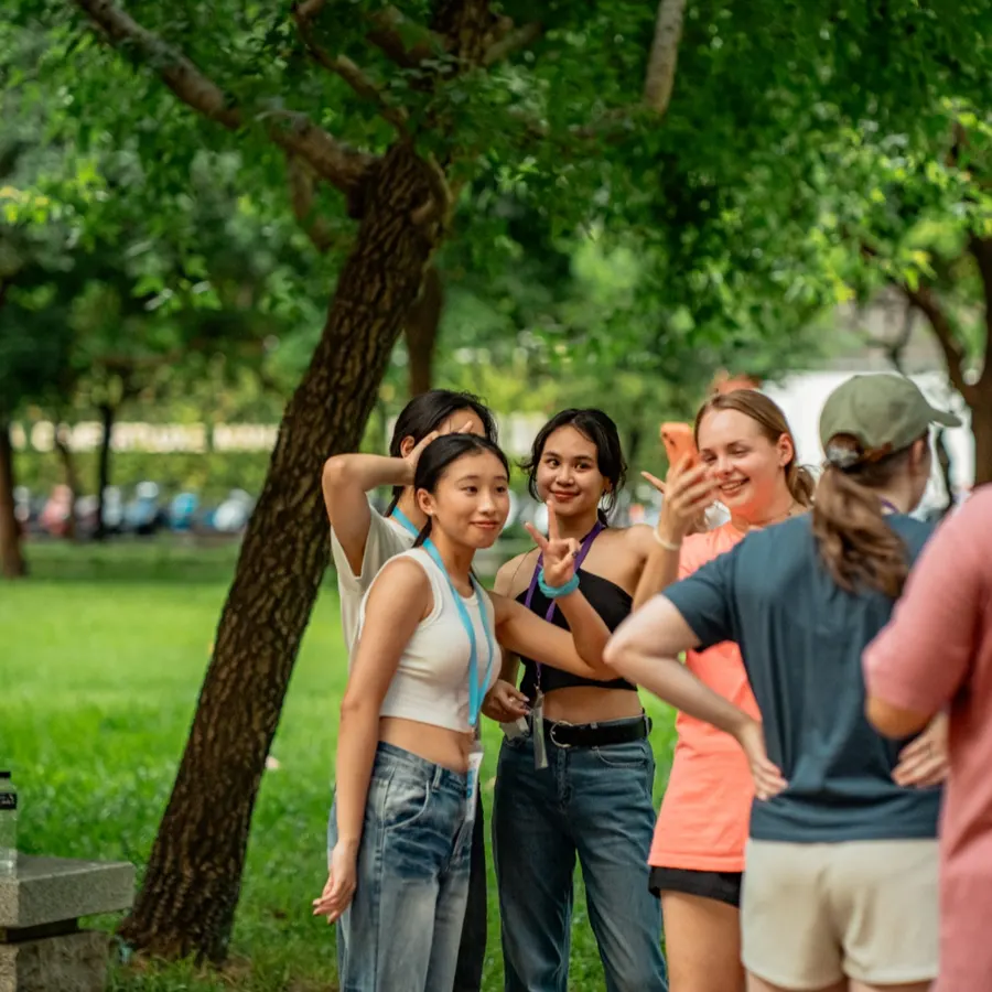Students laughing together in the park