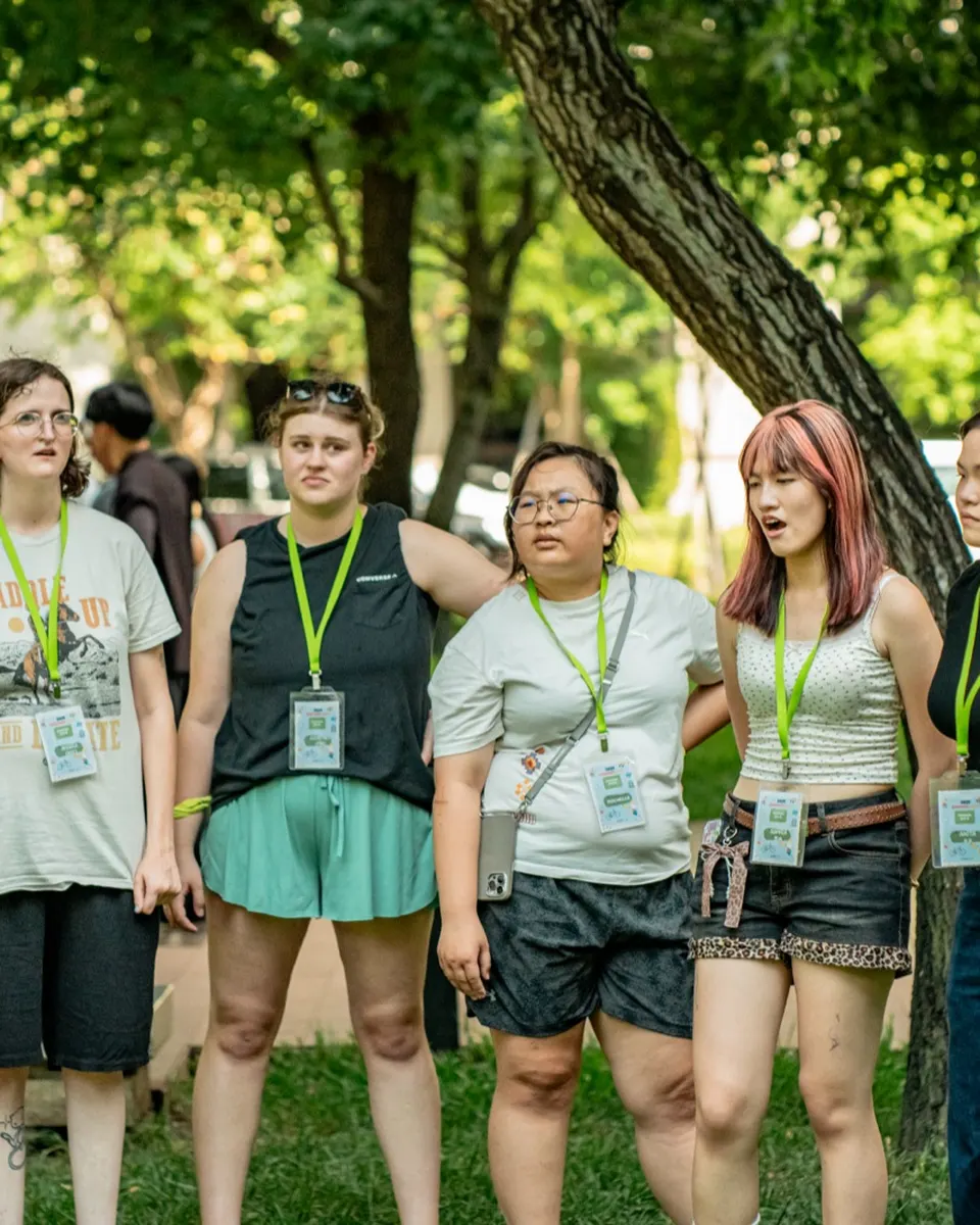 A visiting team and Taiwanese students together at the college camp
