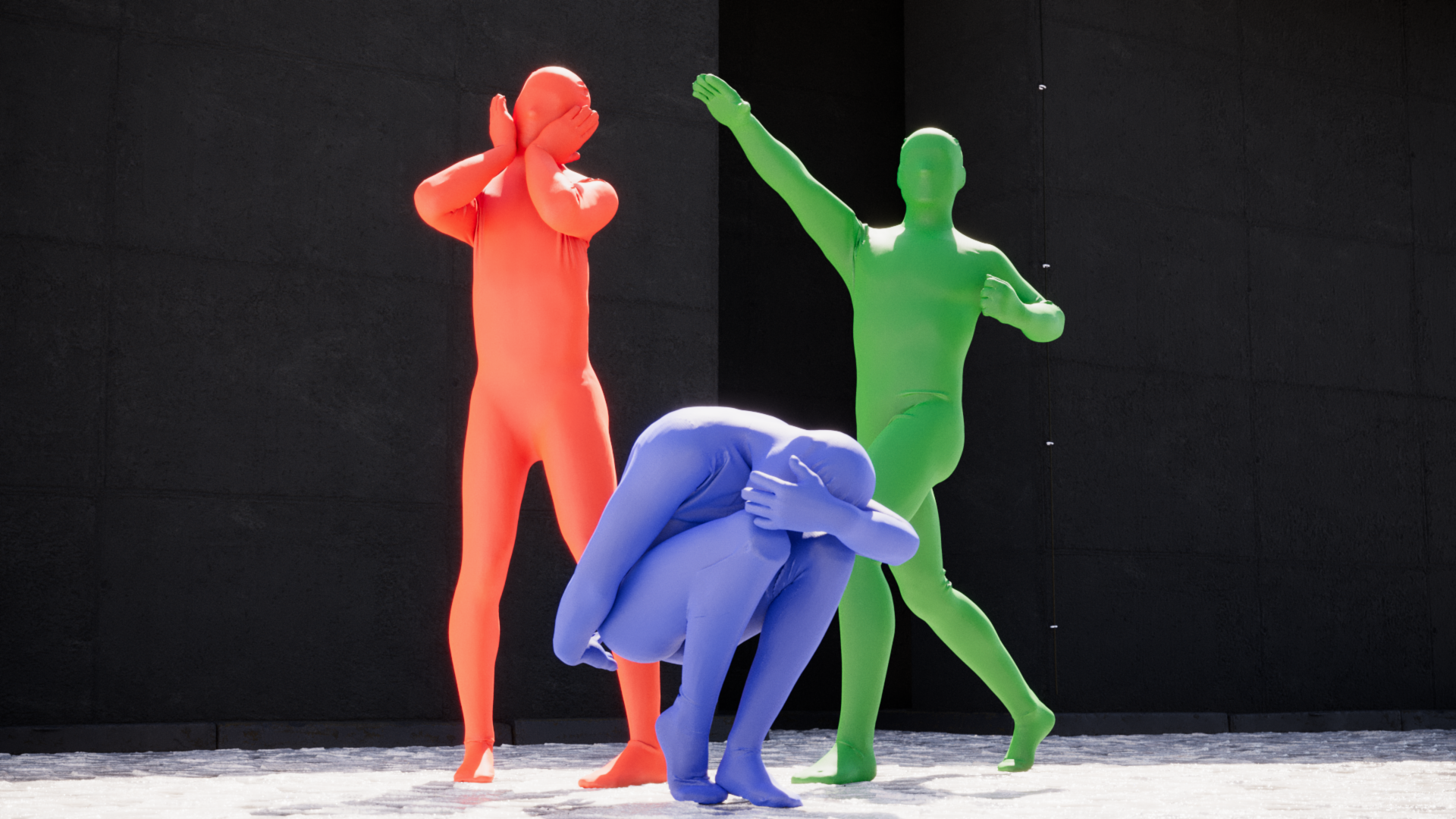 Three morph-suit characters dressed in red, blue and green. These are Morph-men.