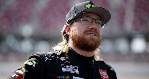 Tyler Reddick stares up triumphantly