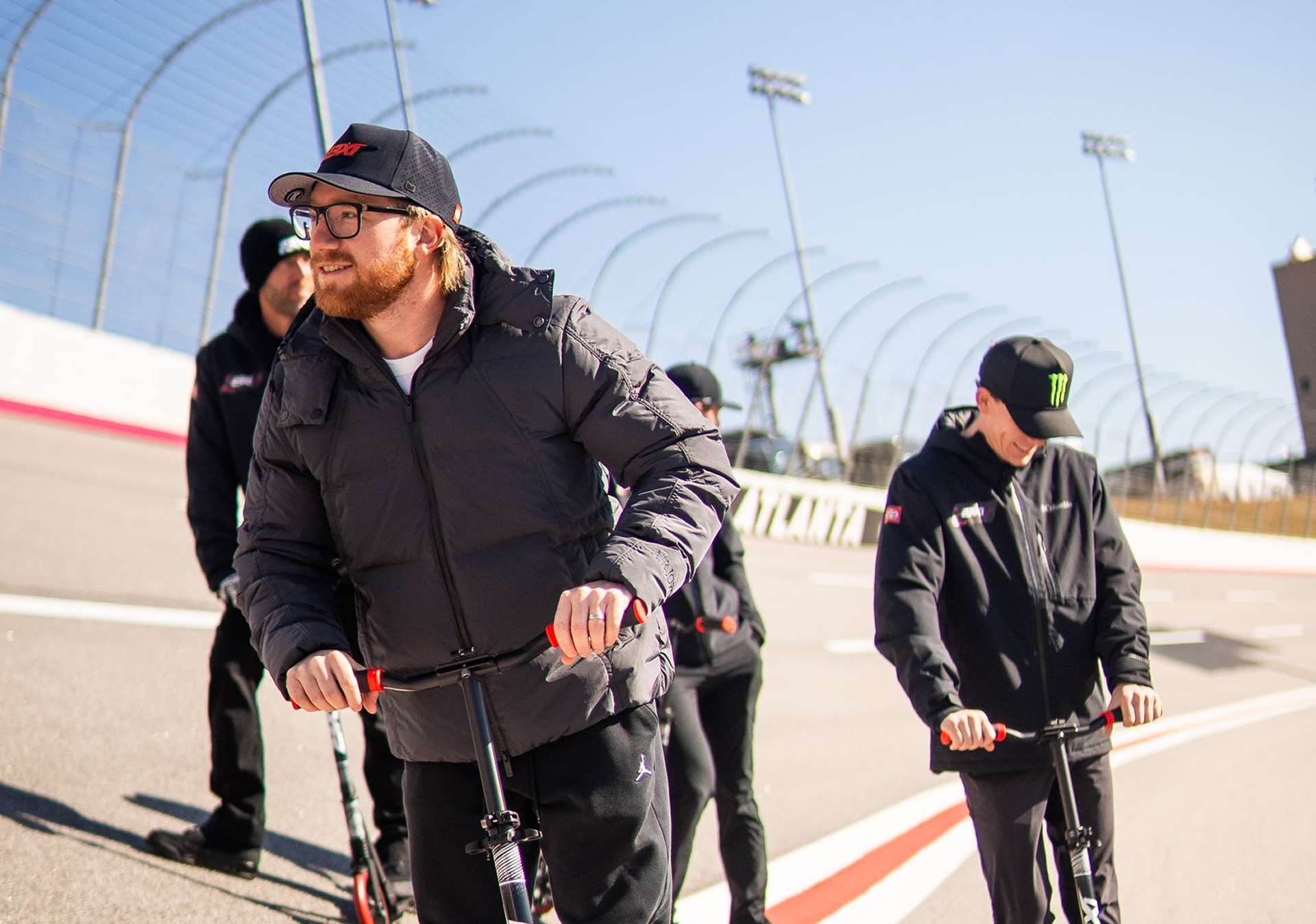 Riley Herbst hangs out of his car