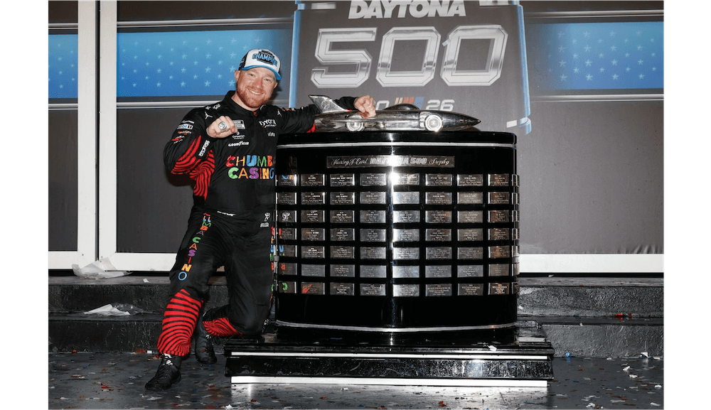 Tyler Reddick celebrating with trophy