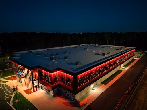 23XI Racing Headquarters lit up aerial footage at night