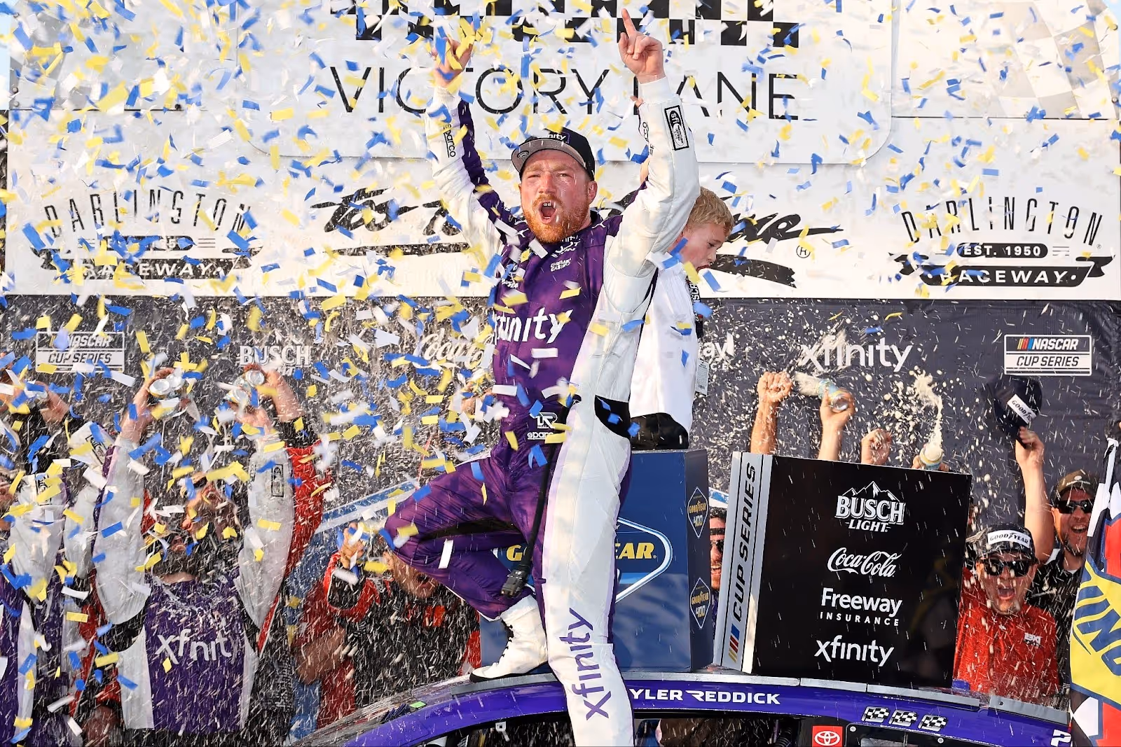 Tyler Reddick celebrates his win