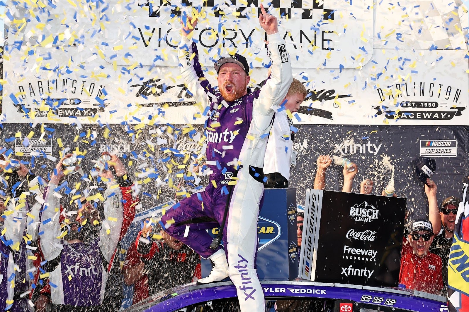 Tyler Reddick celebrates his win