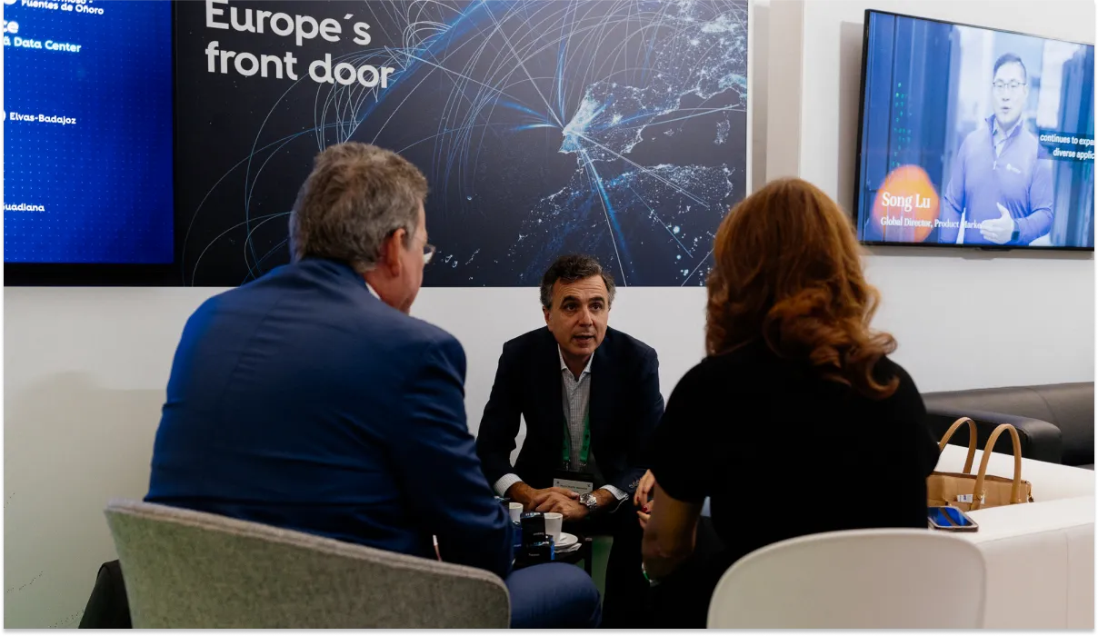 Exhibitor engaging with attendees at the Atlantic Convergence event