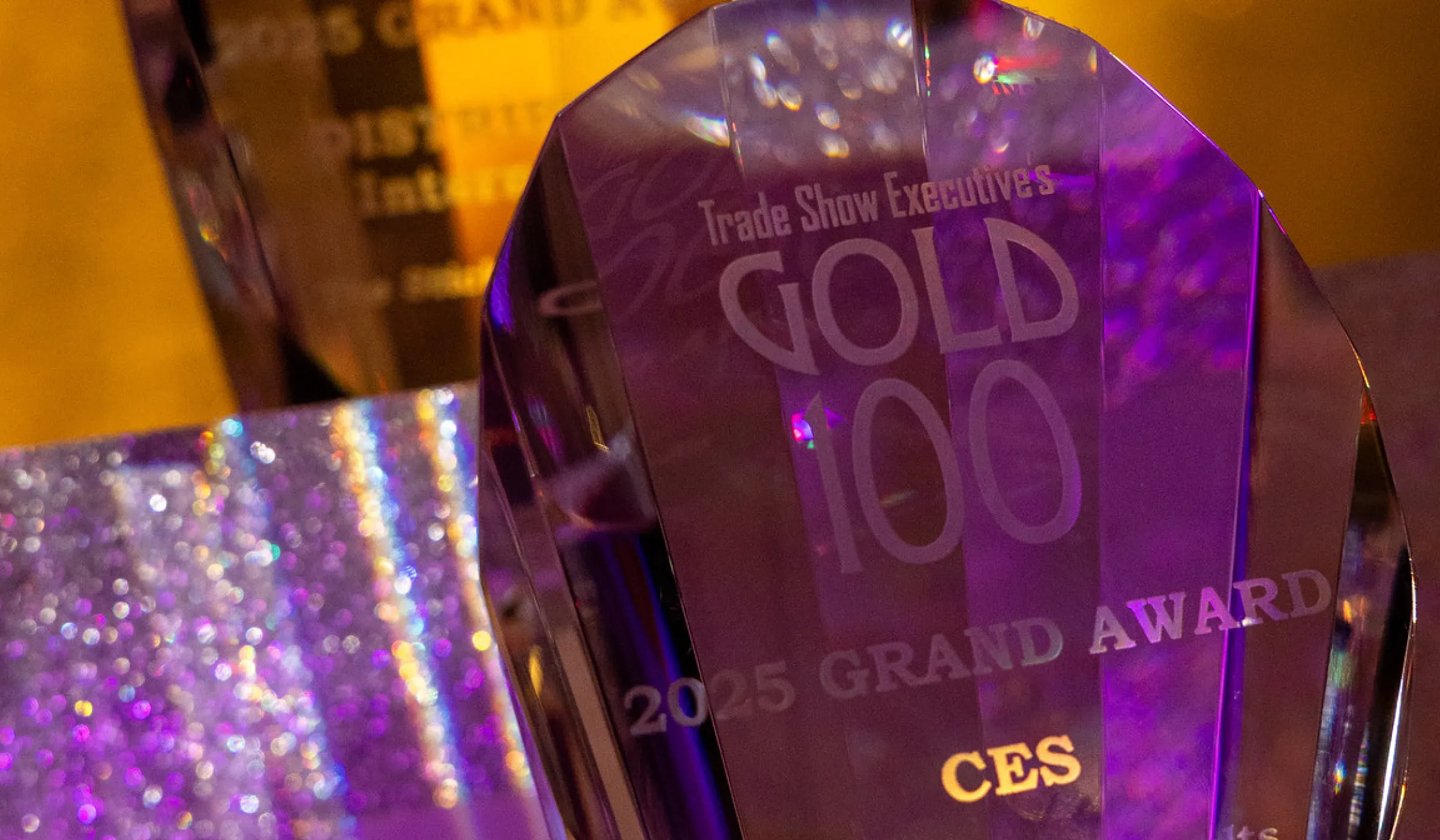 Trade Show Executive Gold 100 Awards 2025 trophy presented to CES for the Grand Award, photographed at the Gold 100 Awards Gala in Palm Springs.
