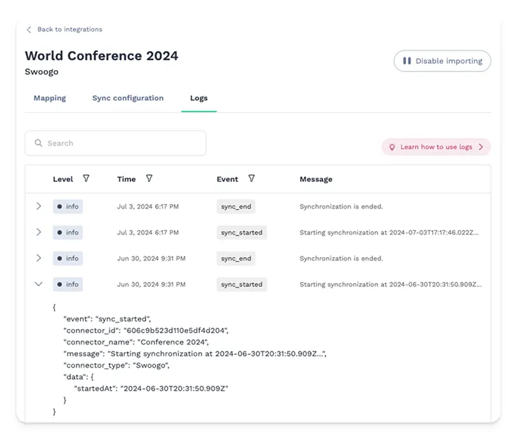 Integration log showing successful data syncs between Swoogo and Swapcard during a live event