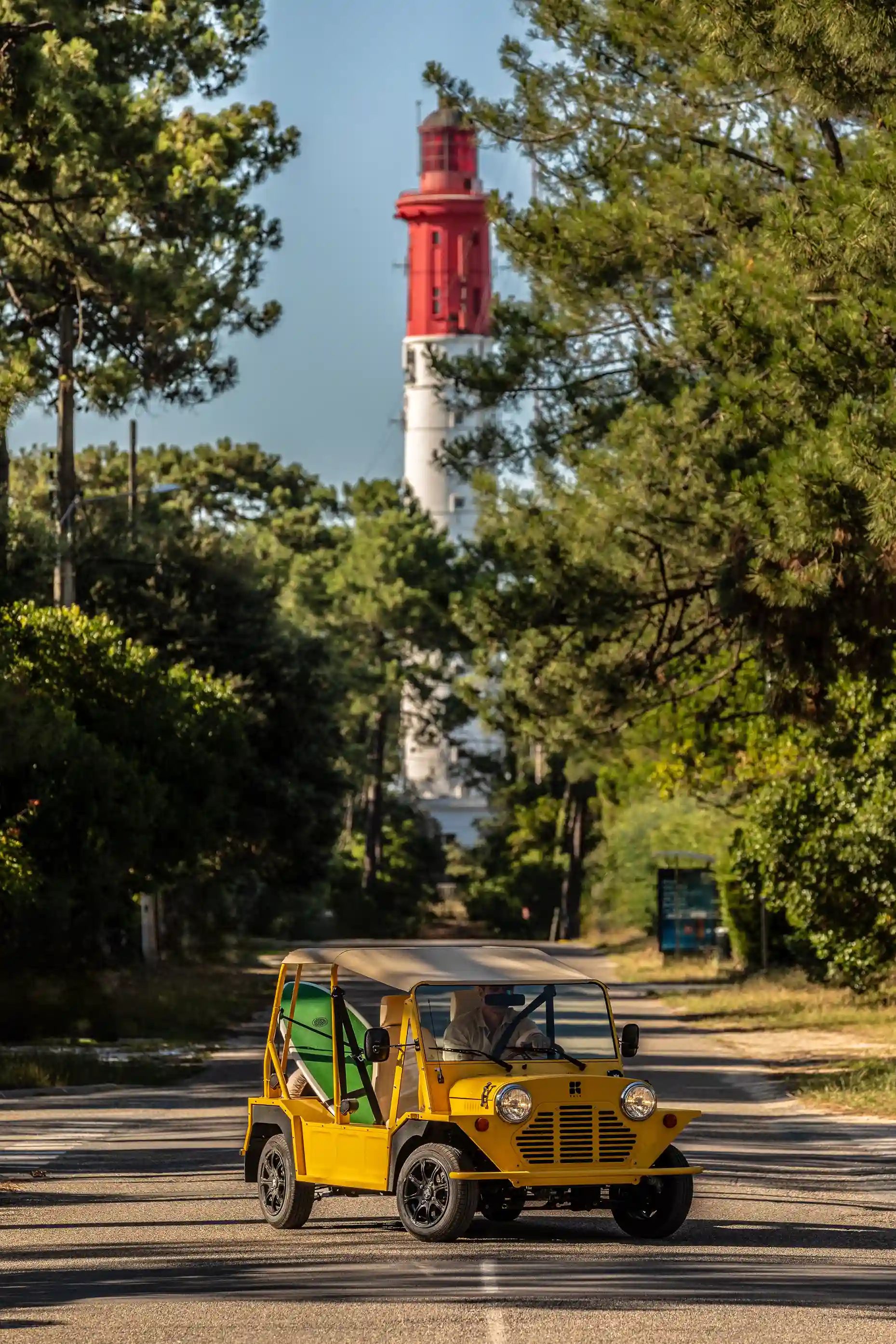 An Yellow Electric Beach Car Mini Moke Beach Buggy brand Kate at Cap Ferret