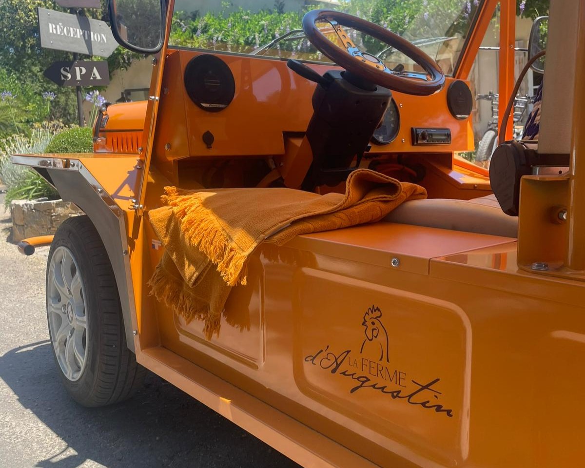 A Mini Moke "KATE" with the beach towel use to make body color of the kate of the Hôtel La Ferme d'Augustin at Saint-Tropez