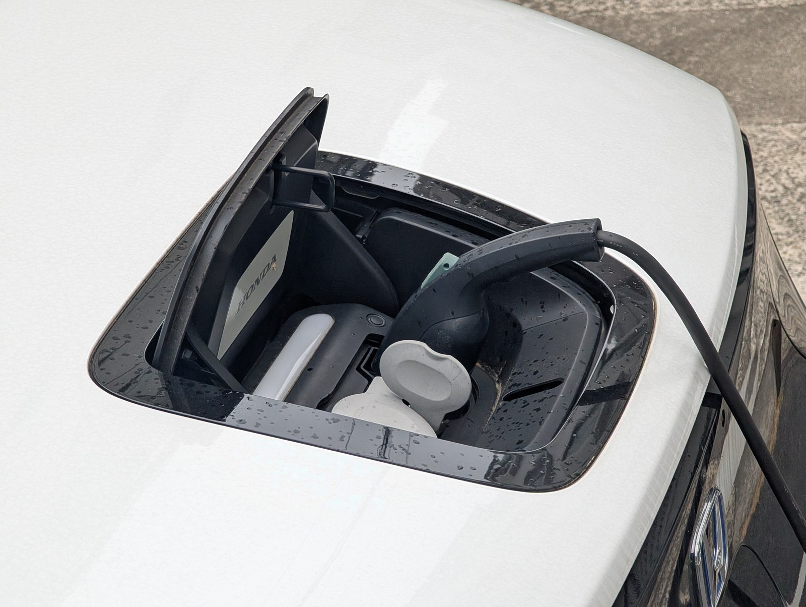 An electric car charging at home