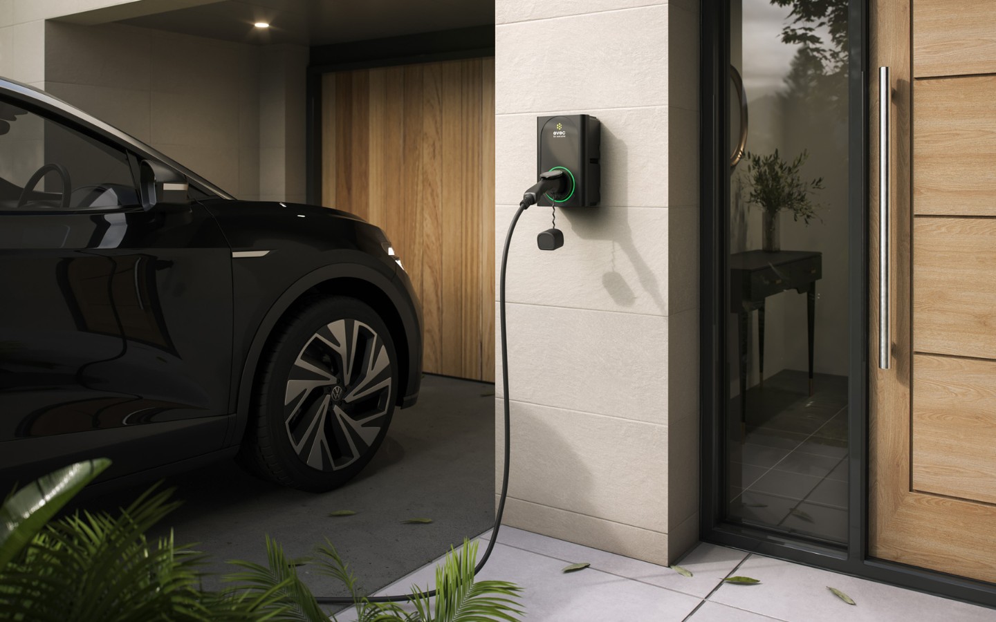 EVEC home EV charger mounted on a modern house wall