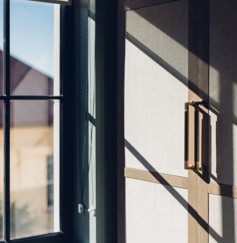 Wardrobe furniture and large windows with lots of light
