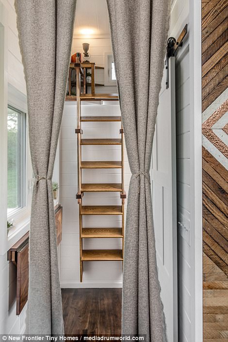 Some of the other key features of The Escher include a full-size porcelain farmhouse sink, poplar interior siding and LED custom lighting throughout the property