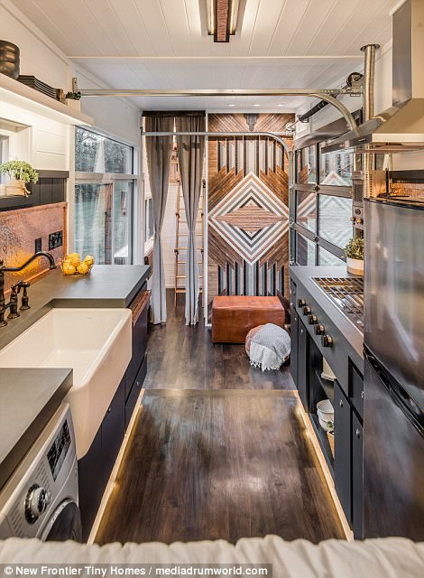 The house contains all of the facilities expected in a modern home including a fully working kitchen