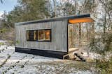 Exterior, Wood Siding Material, Flat RoofLine, Tiny Home Building Type, Metal Siding Material, and Glass Siding Material The corrugated exterior echoes an old, corrugated shed on author Cornelia Funke's Malibu property.
