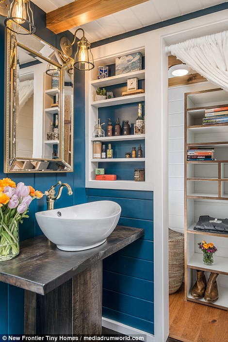 Some of the other key features of The Escher include a full-size porcelain farmhouse sink, poplar interior siding and LED custom lighting throughout the property