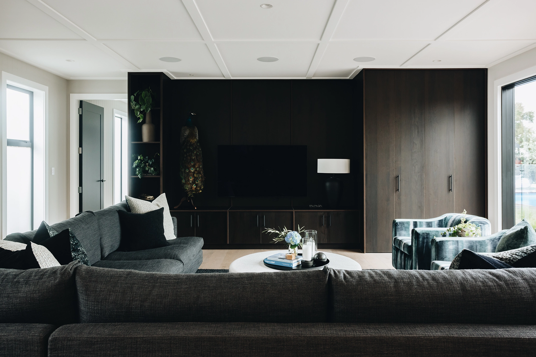 dark timber joinery in open-plan living space
