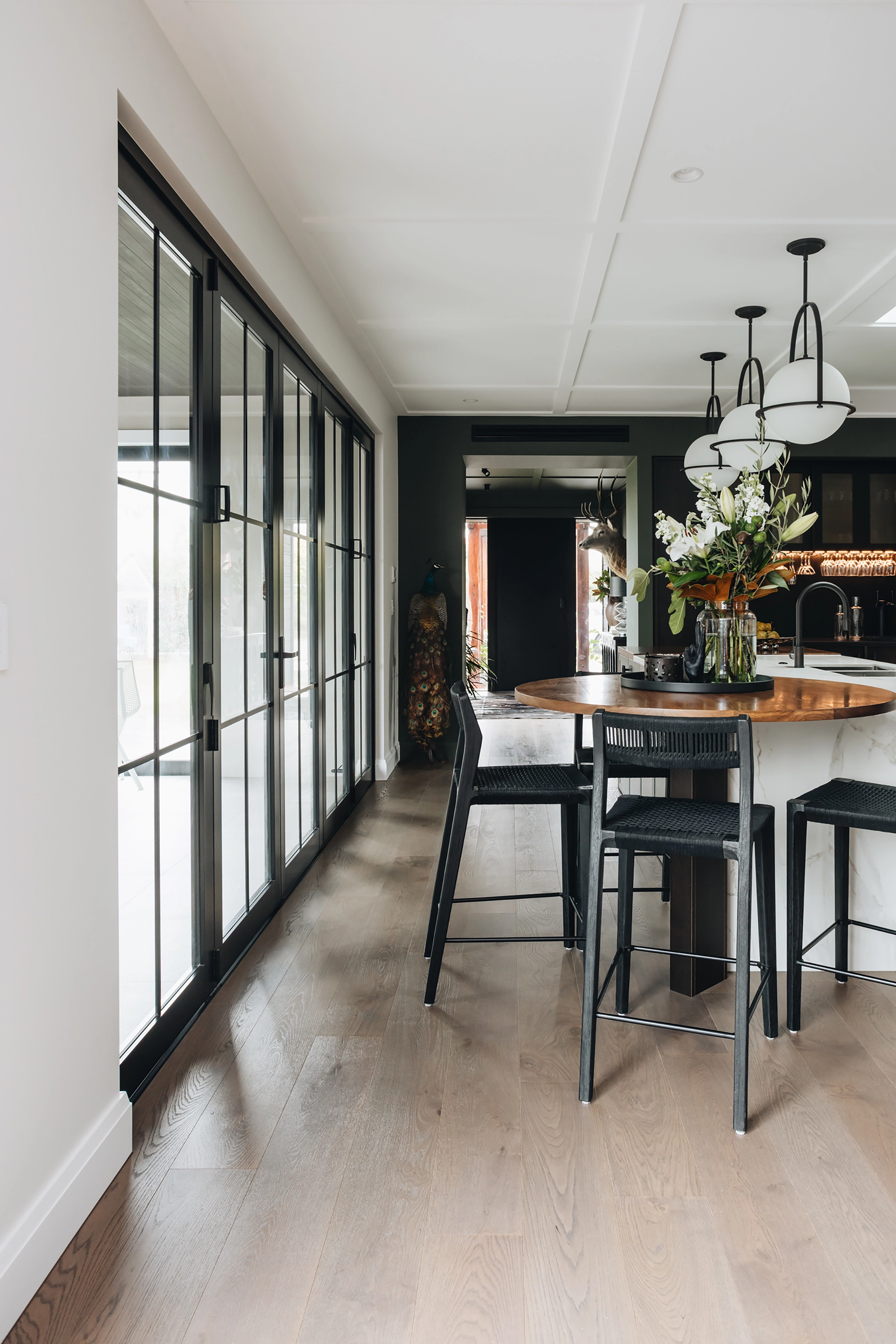 Light-filled dining room with timber flooring