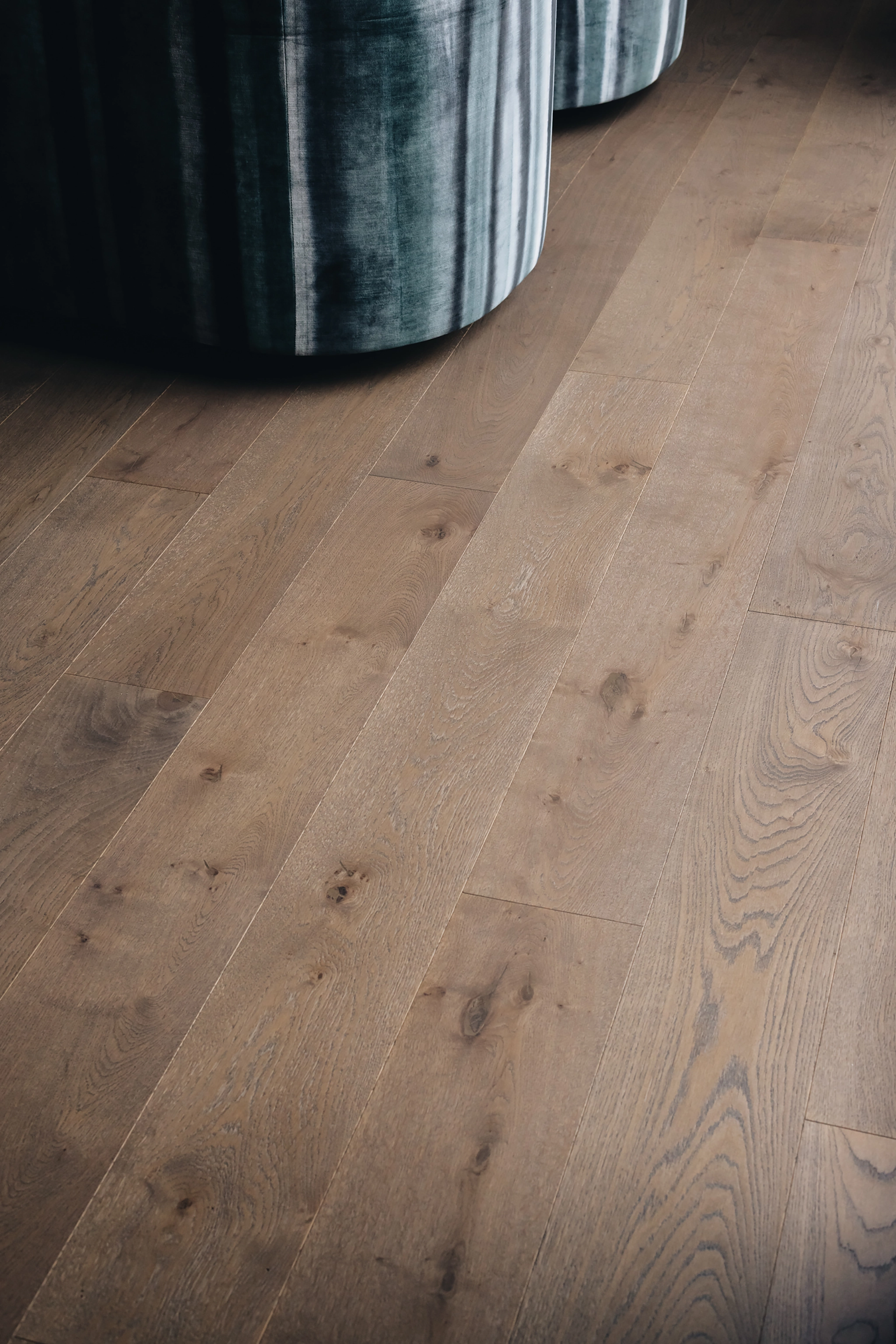 wooden floors anchoring social living zones