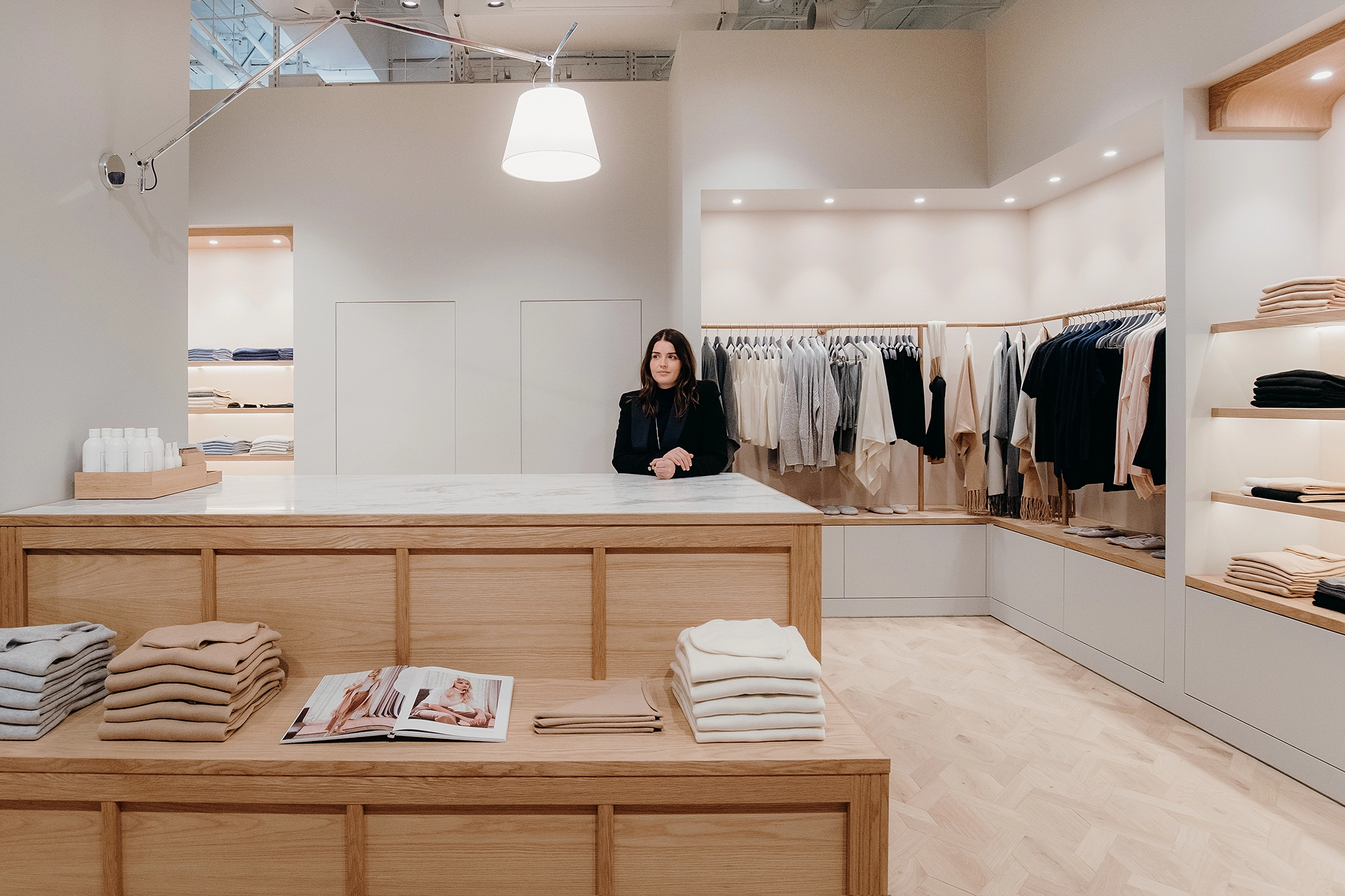Spacious retail area with wood flooring Auckland, featuring warm natural oak timber flooring
