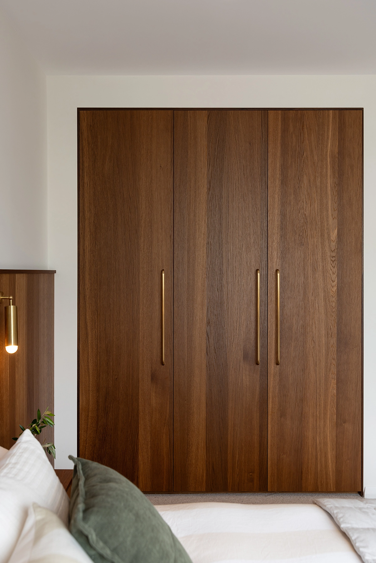 wardrobe joinery with smoked oak timber panels