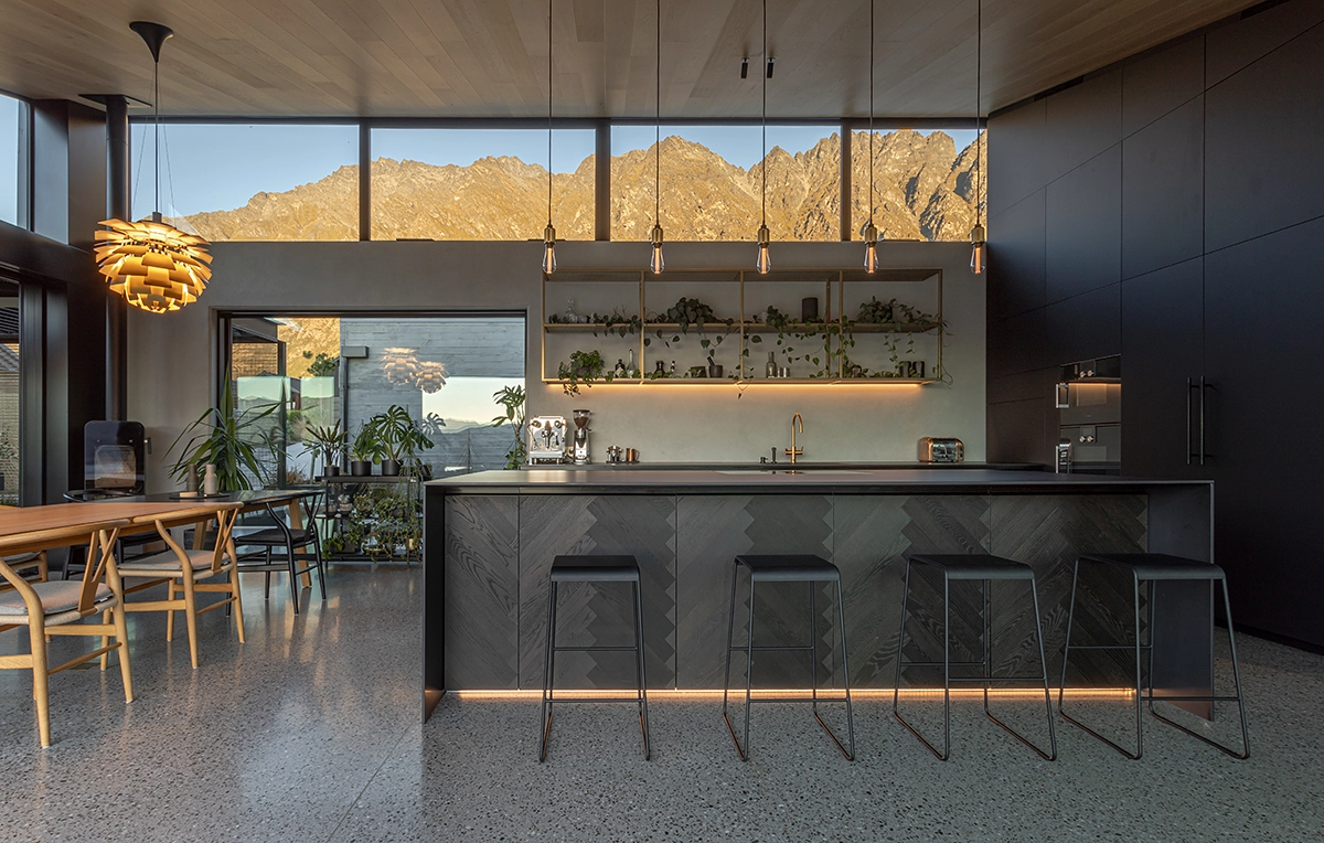 Dark oak herringbone timber cladding behind island bench