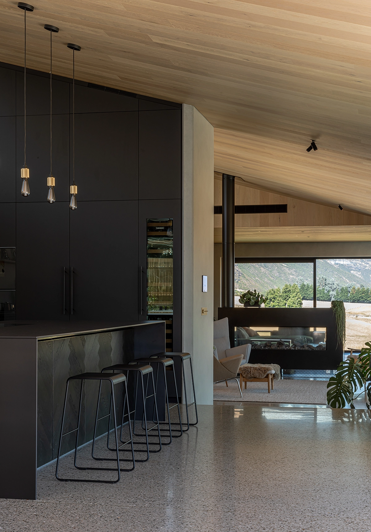 Timber cladding in black herringbone oak used on kitchen island