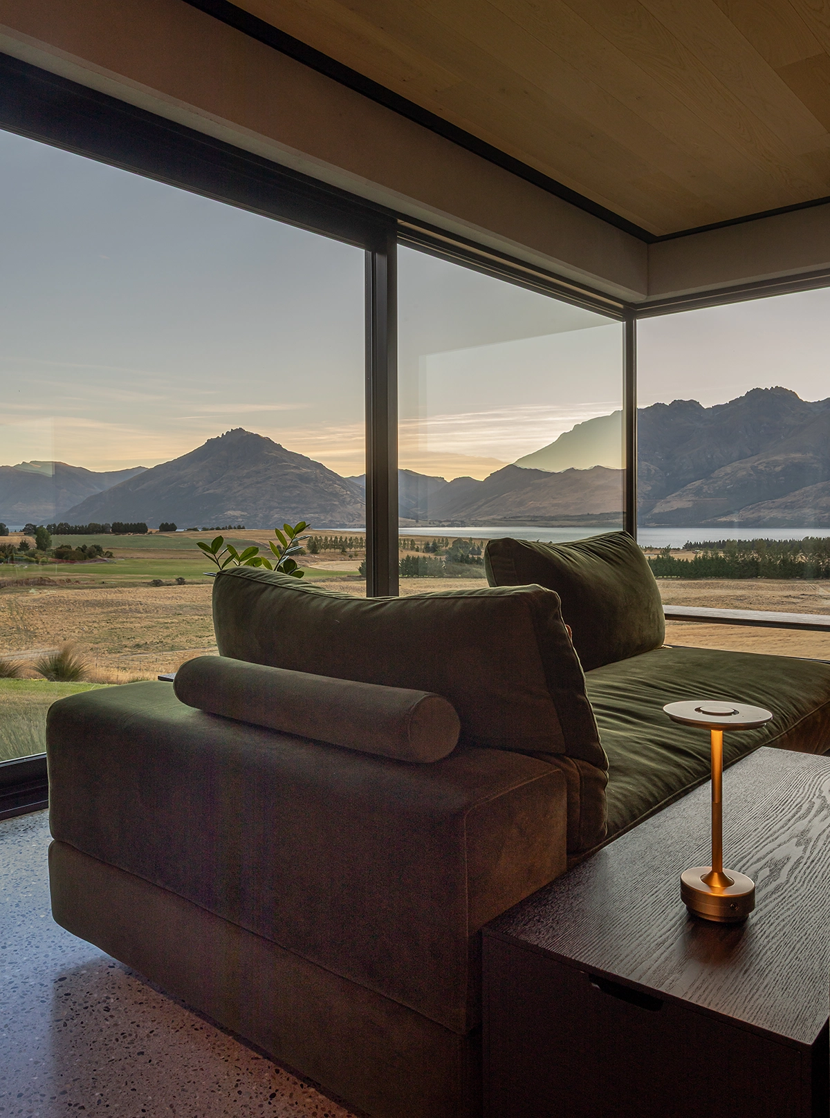 Living room Ceiling lined with warm blonde timber planks