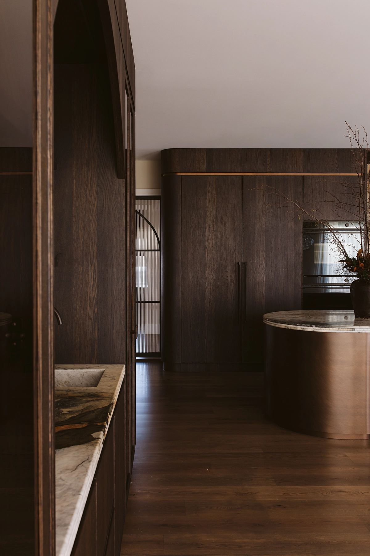 Rowson Kitchens design with dark wood cabinetry