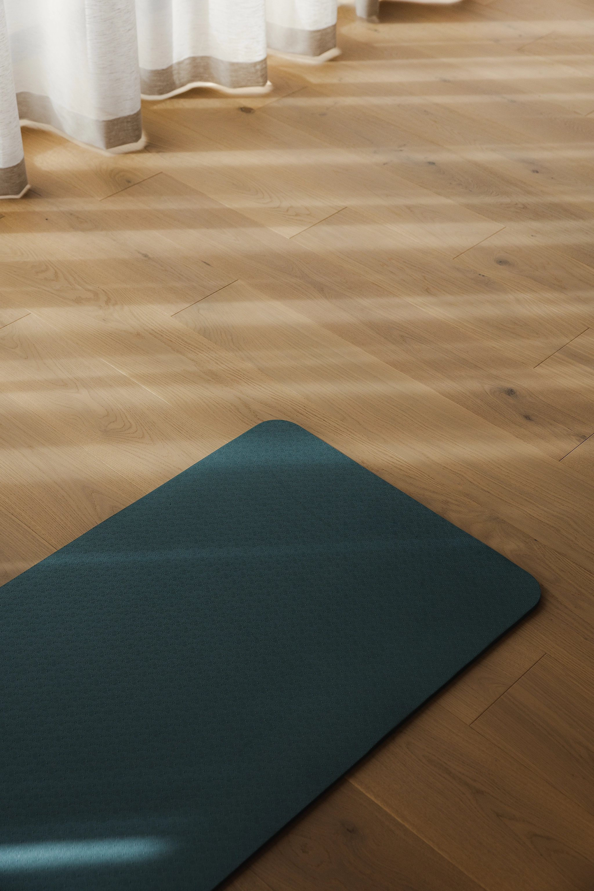 Yoga and reformer Pilates studio with natural timber flooring
