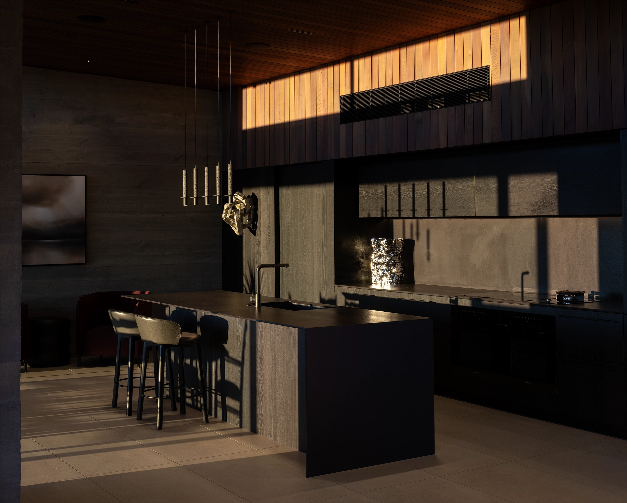 Textured oak veneer joinery adding depth to kitchen space