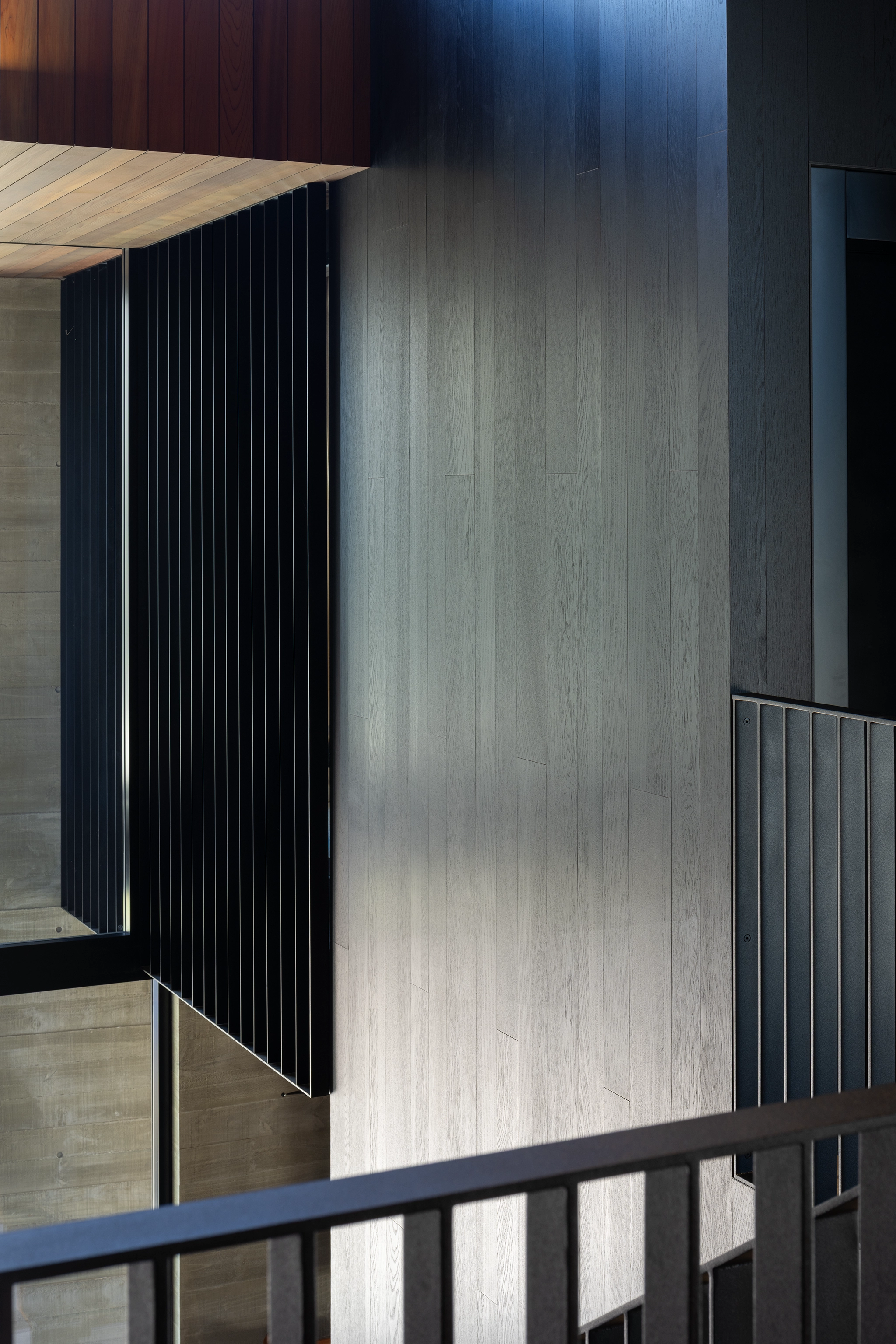 Refined dark oak veneer panels with natural grain detail