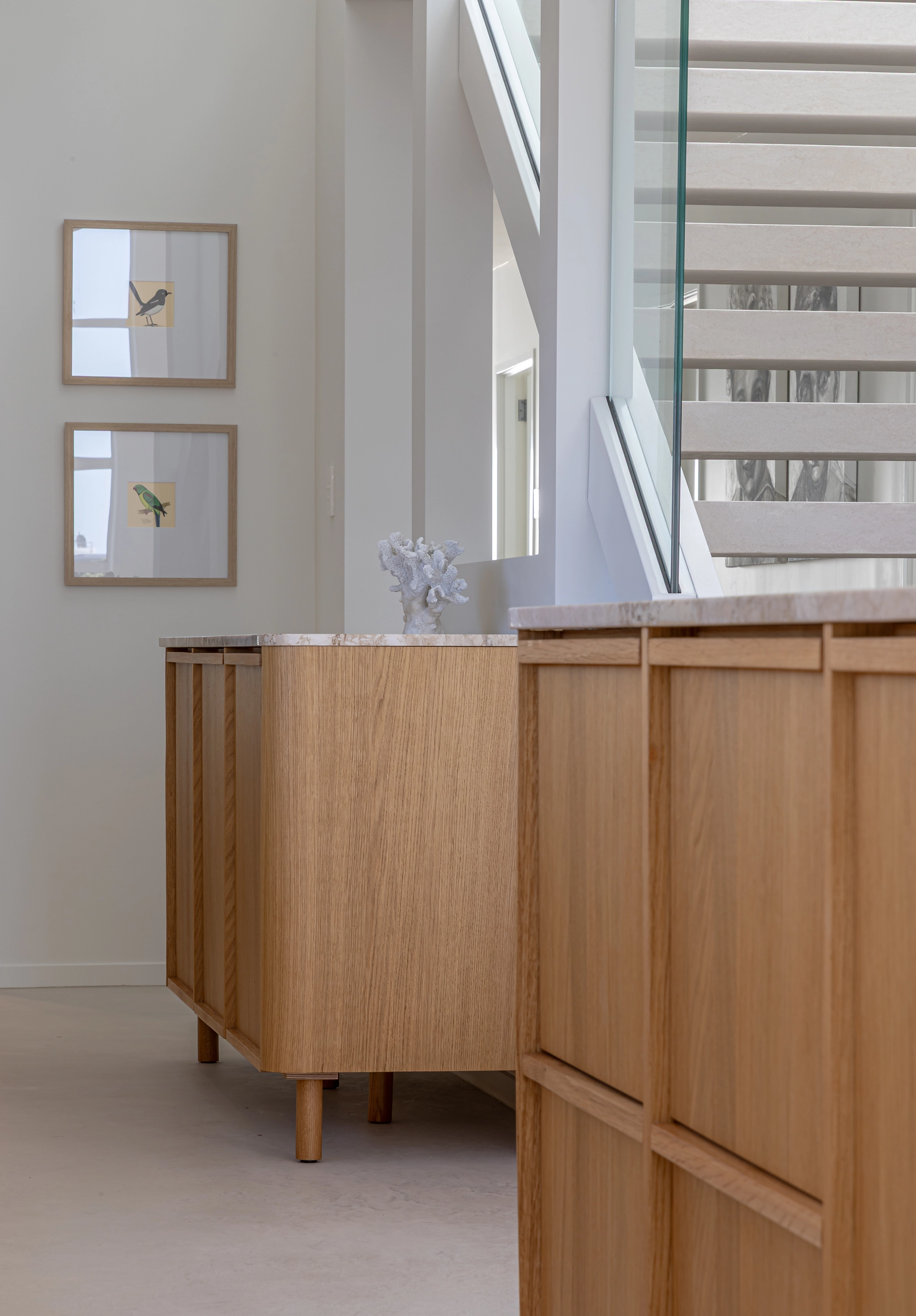 Kitchen interior blending timber, stone, and soft neutrals